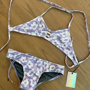 NWT Jolyn tomcat top and Andy bottoms in print “disco” size small